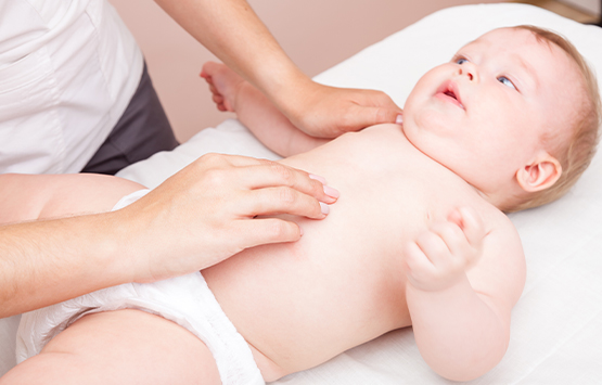 Infant receiving chiropractic care for colic at Advanced Health Chiropractic