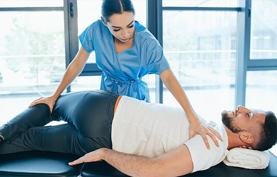 Male patient receiving chiropractic treatment for sciatica at Advanced Health Chiropractic in Livermore