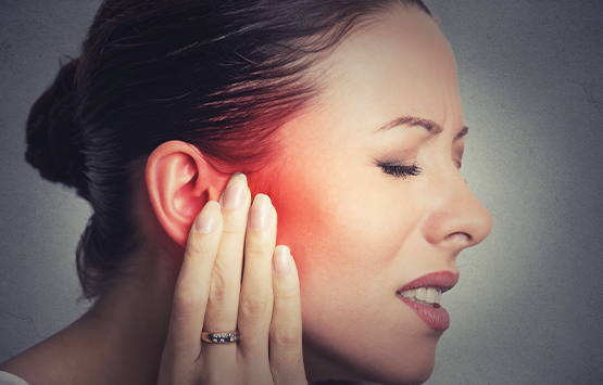 Woman suffering with severe inner ear infection